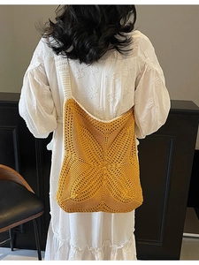 Chic hollow-out knitted shoulder bag in bright yellow for beach and summer travel