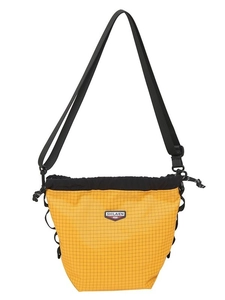 Yellow plaid drawstring crossbody bag with adjustable wide black nylon shoulder strap