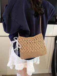 Large woven straw crossbody bag with white lace bow and pearl pendant for summer beach