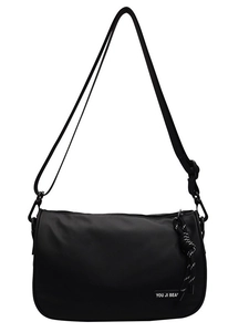 Minimalist black nylon crossbody messenger bag with adjustable strap and casual design