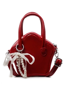 Mini red star shaped crossbody bag with glossy patent leather and pearl bow charm