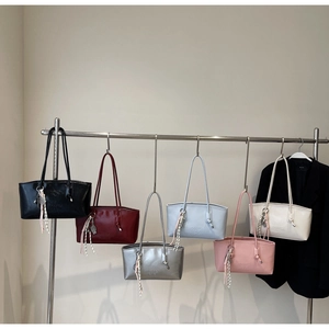 Selection of large capacity PU tote bags in six colors with stylish knot pendants