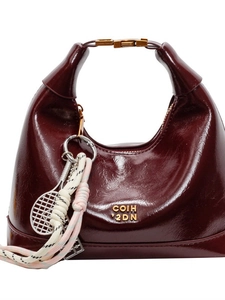 Deep burgundy leather dumpling bag with glossy finish and gold metal clasp detail