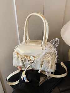 Chic pleated pearl white bowling bag with beaded charms and lace bow detailing