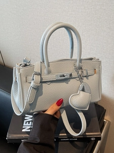 Elegant light grey litchi grain handbag with metal lock and heart pendant for women