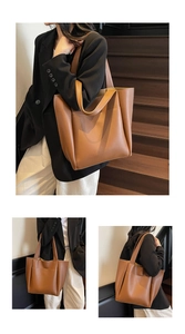 Brown large capacity tote bag shown on shoulder with minimalist business style aesthetic
