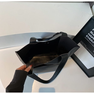 Top view of large black tote bag showing spacious interior with magnetic closure