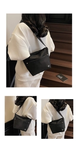Détail de la sacoche noire en nylon avec bandoulière réglable et rivets métalliques