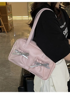 Pink ribbon bow shoulder bag with silver lace details for chic everyday commute
