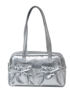 Silver metallic shoulder bag featuring double bow pockets and Y2K vintage aesthetic