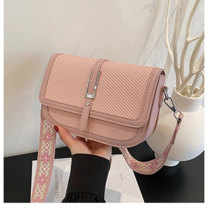 Pink woven texture shoulder bag with stylish metal buckle and wide patterned strap