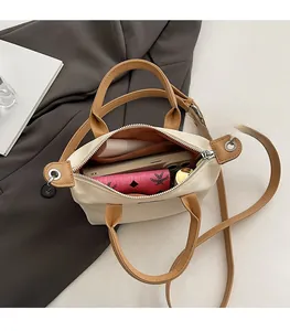 Top view of bucket bag interior showing spacious capacity for phone and makeup