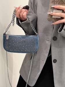 Blue denim saddle bag with silver rhinestones and chain strap for shoulder or crossbody wear