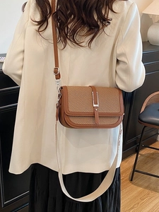 Vintage brown leather crossbody bag with woven panels and dual interchangeable straps