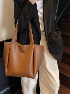 Brown faux leather tote bag for women with large capacity and minimalist design