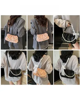 French style ruched crossbody bag with oversized pearls and lace bow detailing