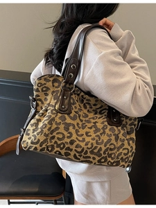 Minimalist large leopard print tote bag with woven texture and leather handles