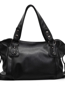 Classic black faux leather tote bag with silver ring accents and double handles