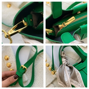 Detail view of green litchi texture handbag with gold hardware and patterned silk scarf