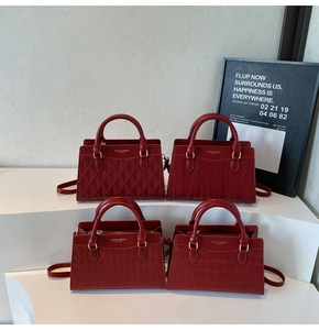 Detail showing four texture variants of red handbags including quilted and croc-embossed finishes