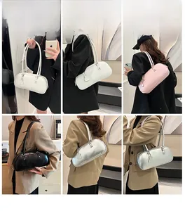 Detailed views of minimalist cylindrical baguette shoulder bags in white, pink, black and silver