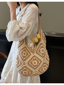 Bohemian handmade crochet shoulder bag featuring retro sunflower granny square patterns