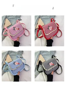 Detailed grid view of plaid canvas bags with lace trim in pink, red, blue, and black