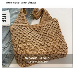Detail shot of hollow crochet texture on a straw beach tote bag with a beige inner lining