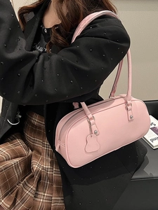Pink cylinder leather shoulder bag with silver zipper and charm for women