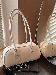 Minimalist cream white leather underarm bag with double straps and matte finish