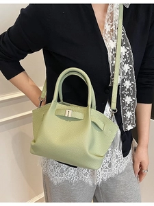 Fashionable pistachio green bucket bag in lychee texture leather for women