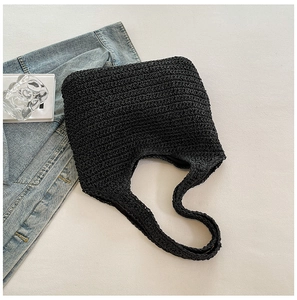 Detail shot of the black hand-woven mesh texture on this minimalist summer beach tote