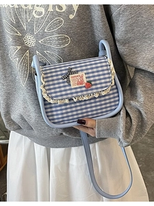 Cute light blue gingham crossbody bag with lace trim, bow and strawberry detail