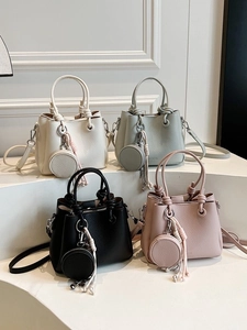 Litchi pattern bucket bag in four colors with detachable strap and small round pouch