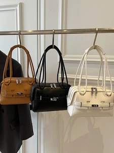 Minimalist leather shoulder bag set in brown black and white with metal buckle