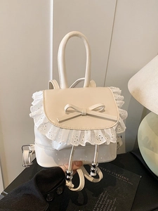 Chic ballet-style cream backpack with lace embroidery and bow accent for women
