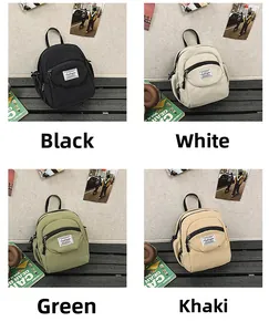 Detail view of mini crossbody shell bags in black, ivory, green and khaki color options