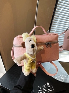 Pink lychee texture box handbag with cute cartoon plush charm and top handle