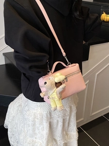 Pink lychee grain box bag with cute puppy plush charm for women cross-body style