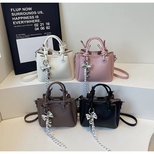 Litchi texture leather bucket bags in ivory, pink, brown, and black colors