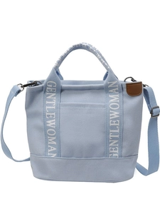 Light blue canvas tote bag with adjustable shoulder strap and GENTLEWOMAN branded handle