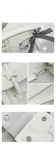 Detail of white messenger bag featuring a lace bow, star patch and magnetic silver clasp