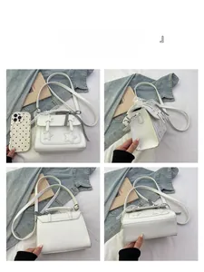 Detailed views of a white PU star messenger bag with lace and a bow tie accent