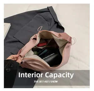 Internal capacity of pink pleated nylon tote bag showing coffee cup and accessories