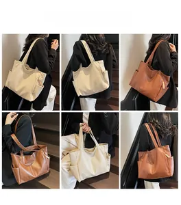 Detailed views of a large capacity tote bag in beige and brown colors with vertical zippers