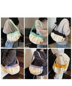 Detail shots of pleated canvas crossbody bags in green, purple, yellow, and black colors
