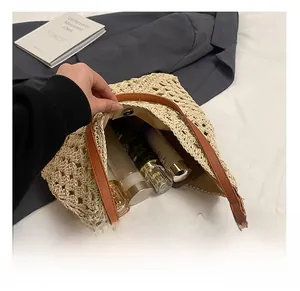 Detail view of woven straw tote bag interior showing capacity for cosmetics and skin care