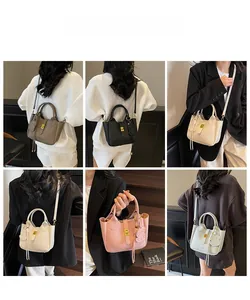 Collage of leather bucket bags in six colors including grey, beige, and pink for women