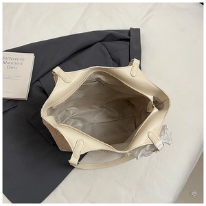 Minimalist cream woven tote bag with large capacity, interior pockets and top zipper closure