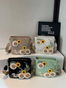 Chinese pastoral style bucket bags with floral embroidery and woven straps in four colors